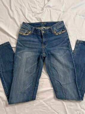 Vintage Y2K Cache blue low rise skinny jeans with gold studs. Size 0